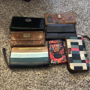 Lot of 7 Fossil Wallets***look at pictures and read ***